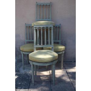 Set Of Four Trianon Gray Lacquered Chairs, Louis XVI Period, 18th Century.