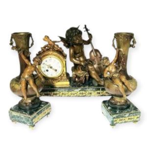 Moreau Patinated Bronze Mantelpiece Featuring A Cello Player