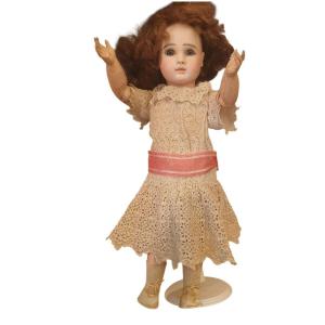 J Steiner Porcelain-headed Doll With Closed Mouth 