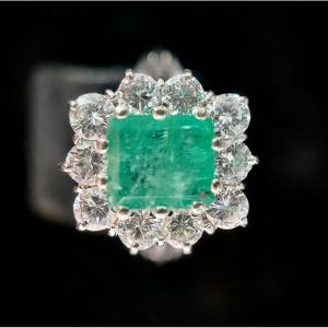 White Gold Ring Set With A 1.10 Carat Emerald Surrounded By 1.30 Carats Of Brilliants
