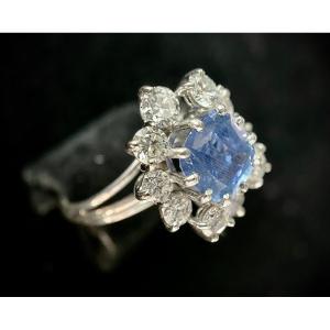 Daisy Ring Set With A 1.80 Carat Cushion Cut Sapphire Surrounded By 1.40ct Of Brilliant