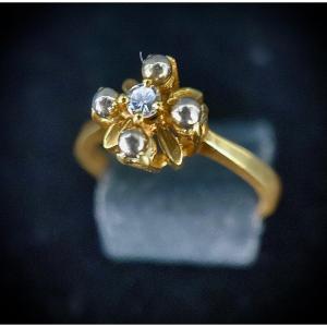 18k Yellow Gold Ring Set With A 0.05 Carat Brilliant