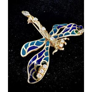 Yellow Gold Dragonfly Brooch With Blue Enamel Wings And A Body Set With Diamonds