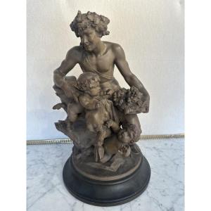 Terracotta By Clodion Representing A Faun Surrounded By Putti