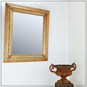 Large Wooden And Gilded Stucco Mirror With Foliage Decoration