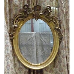 Large Oval Mirror From The Napoleon III Period In Golden Wood
