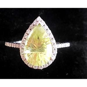 A Vintage Ring Set With A Lemon Topaz And Surrounded By Diamonds In 18ct Gold 