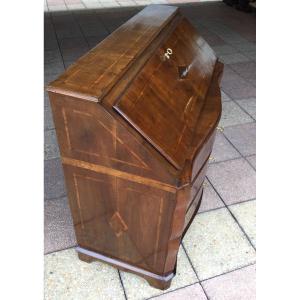 A Walnut Chest Of Drawers And Desk.