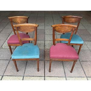 Four Directoire Chairs In Walnut.
