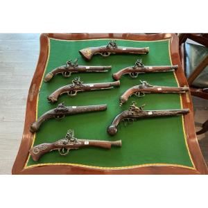 A Collection Of Decorative Pistols.