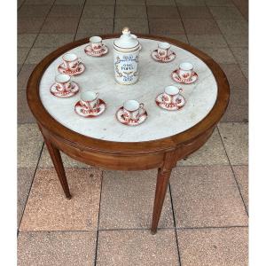 A Louis XVI Mahogany Pedestal Table.