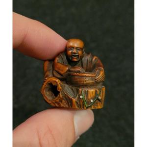 Netsuke - Hana Saka Ji-ji-i - Wood - 19th Century