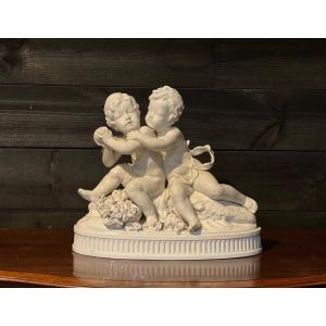 White Enameled Porcelain Group With Capodimonte Cherubs
