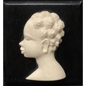 Portrait In Relief In Ivory On Ebony Panel 1930 