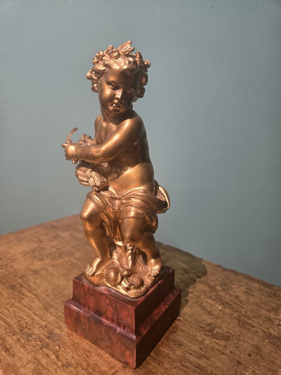 Putto in bronzo con base in marmo, h 20 cm , XIX secolo, firmato 