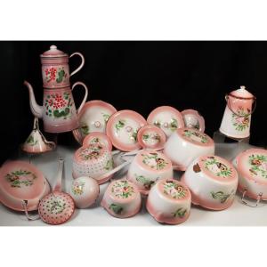 Set Of Pink Enameled Metal Saucepans