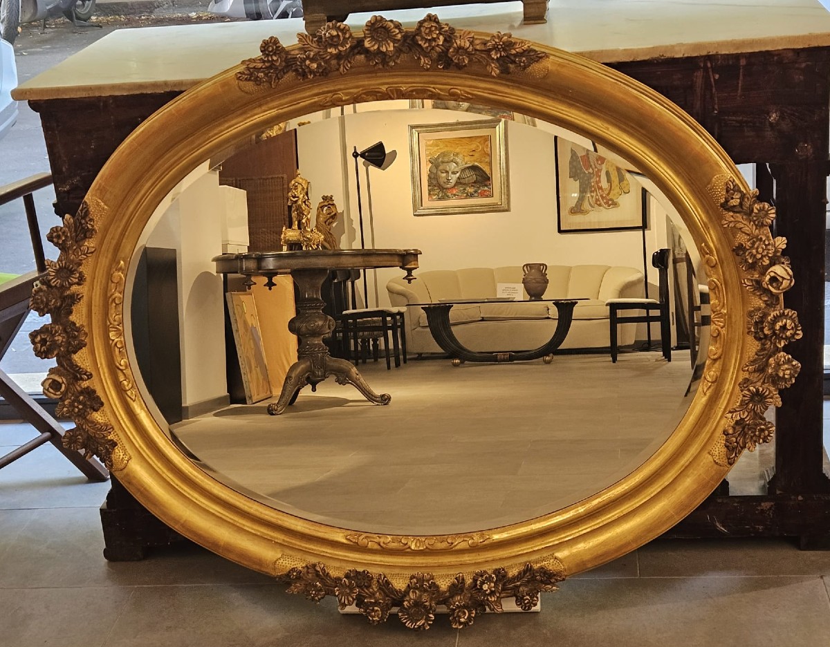 Specchiera in legno intagliato e dorato con fiori