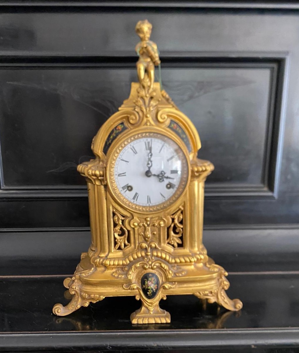 Orologio in bronzo laccato in oro