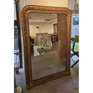 Specchiera fine '800 in legno scolpito e dorato con doratura francese 