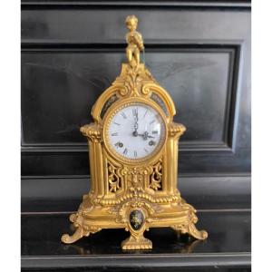 Orologio in bronzo laccato in oro