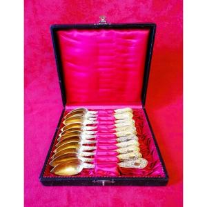 Twelve Small Silver-gilt Spoons 