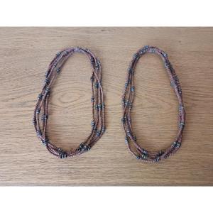 Africa, Two Necklaces, Metal And Plant Fiber, 20th Century.