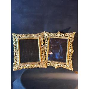 Pair Of Mirrors With Openwork Golden Wood Frames.