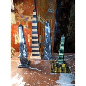 Collection Of Marble And Tiger's Eye Obelisks.