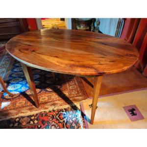 Small Oval Walnut Table From The 19th Century.