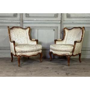 Pair Of Small Louis XV Style Wing Chairs In Carved Walnut, Bosson Stamp, 