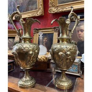 Antique Large Pair Of 19th Century Bronze Ornamental Ewers With Cherub And Putti Decor