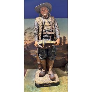 The Guluche, The Breton Hurdy-gurdy Player, Large Polychrome Terracotta Sculpture 
