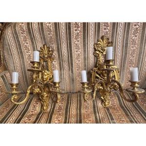 Pair Of Late 19th Century Ormolu Sconces In The Lxiv Style Decorated With Mask And Ostrich Feathers