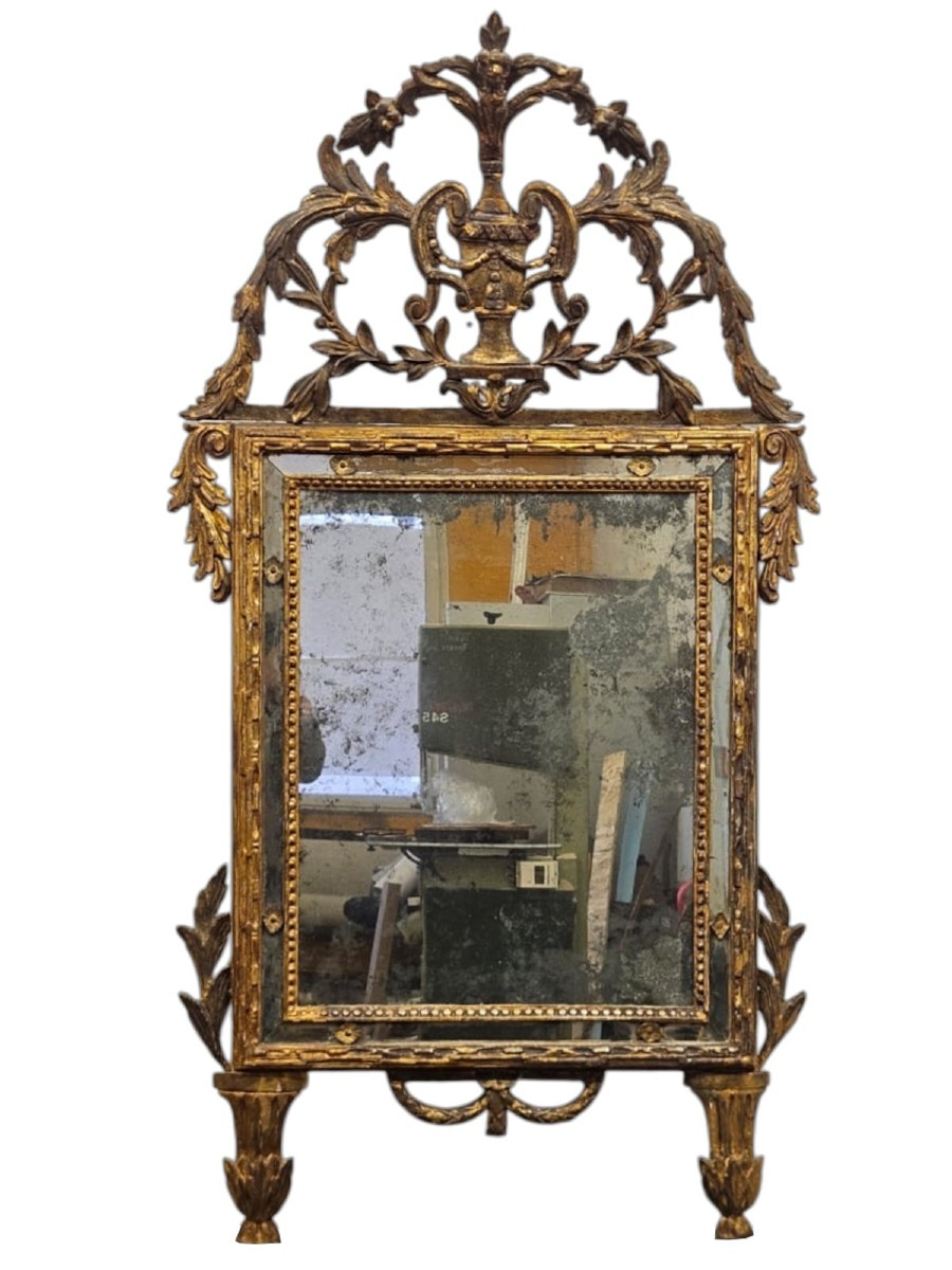 Imponente specchiera Luigi XVI in legno dorato – XVIII secolo