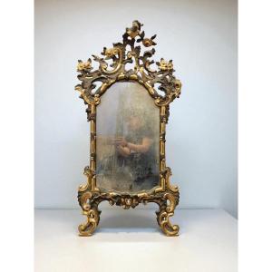 Specchiera laccata e dorata in legno intagliato - XIX Sec.
