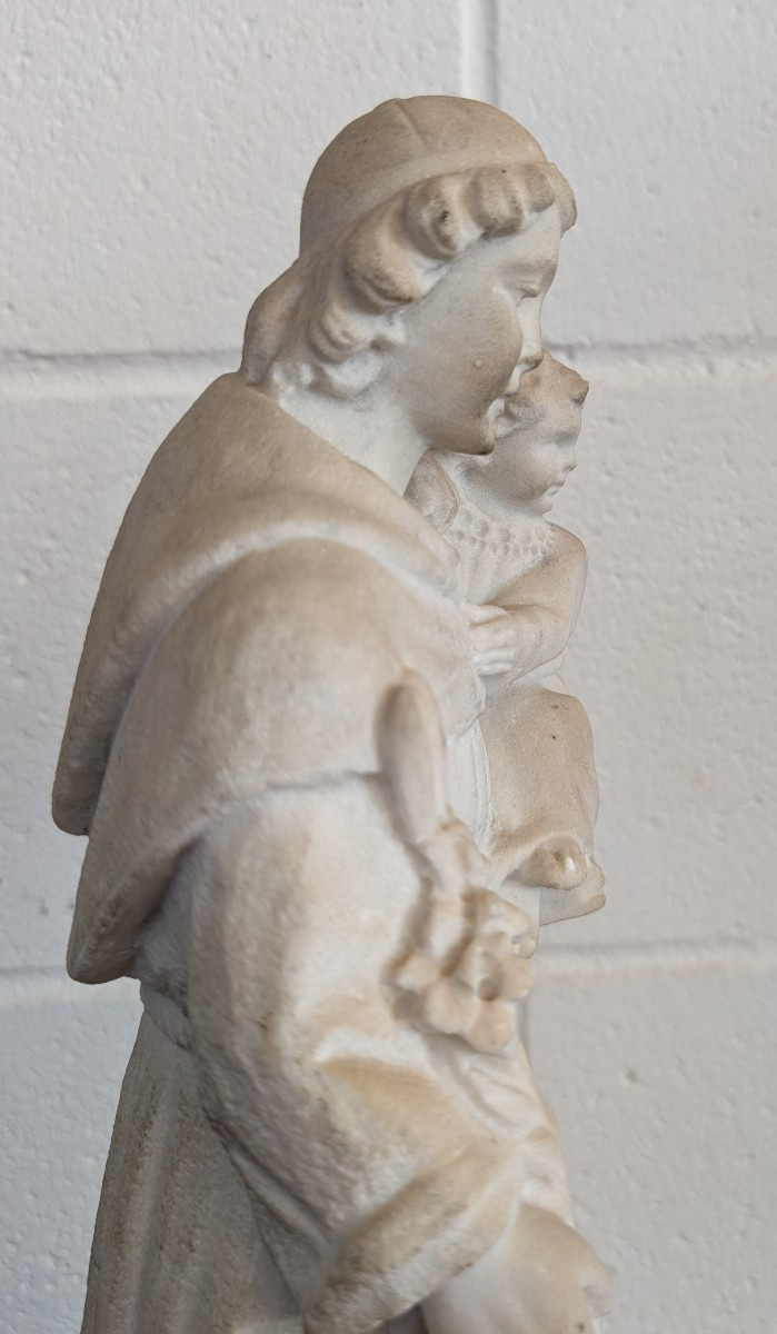 Scultura in marmo raffigurante Sant’Antonio da Padova con Gesù Bambino-photo-1
