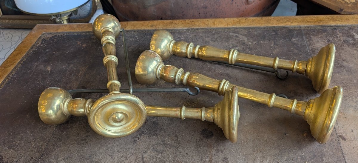 Quattro reggitenda in legno tornito e dorato – XIX secolo
