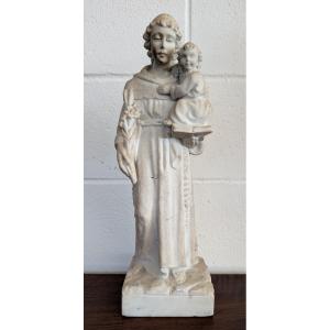 Scultura in marmo raffigurante Sant’Antonio da Padova con Gesù Bambino