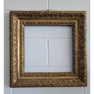 Cornice in legno scolpito dorato, XVIII secolo
