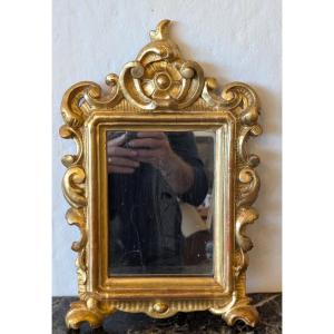 Specchierina in legno scolpito e dorato a oro zecchino – Inizi XIX secolo