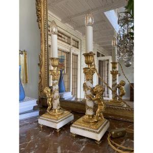 Pair Of Louis XVI Style Gilt Bronze And Marble Candelabras With Putti, 19th Century
