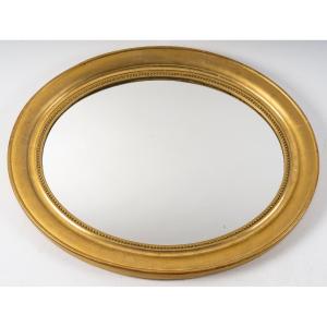 Oval Mirror In Gilded Wood