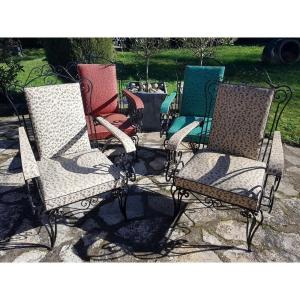 Serie de quatre fauteuils en fer forgé des années 50