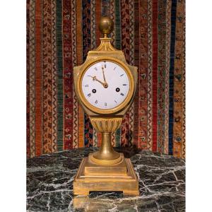 Clock Called Urn In Gilt Bronze From The Empire Period