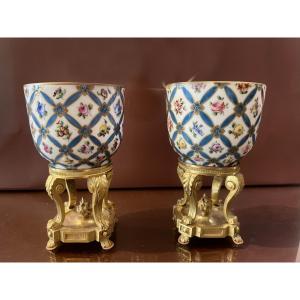 Porcelain Pots On Bronze