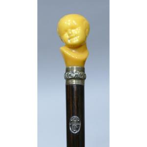 Collection Cane Representating A Child's Head Leaning