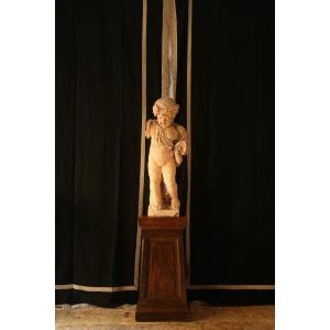 Sculpture En Plâtre Teinté Représentant Un Putto.