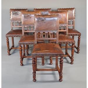 Set Of Six Renaissance-style Chairs Upholstered In Leather Embossed With A Salamander And Fleur-de-lis Motif