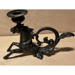 Ancient Candlestick With A Rearing Horse In Patinated Metal, Late 19th To Early 20th Century.