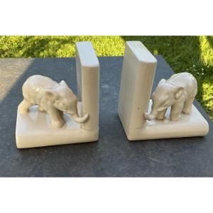 Pair Of Bookends With Baby Elephants In White Cracked Ceramic, Art Deco.